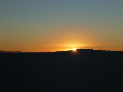 Sun rising over a mountain